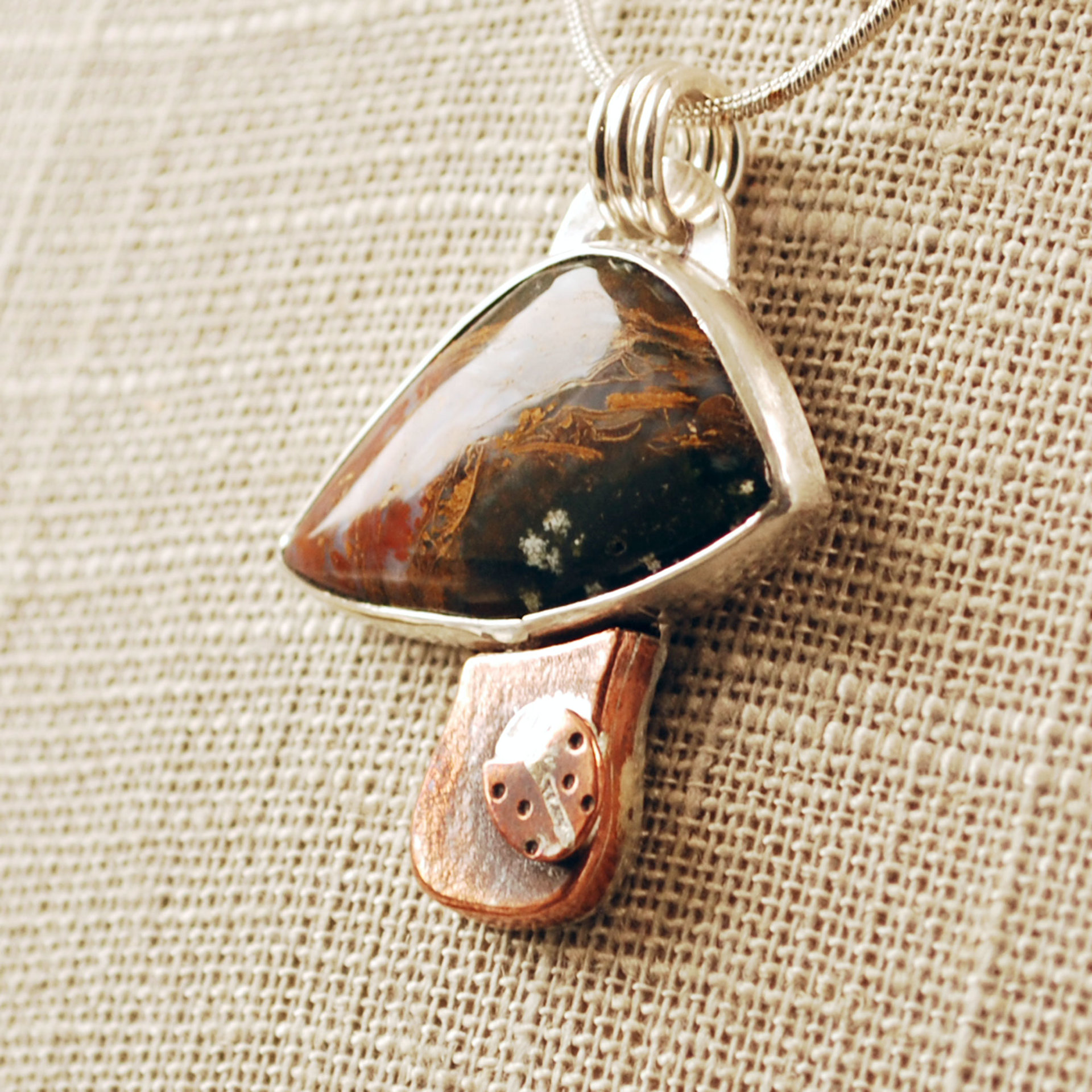 Silver, Copper Mushroom Pendant with Agate and Ladybug close up angle