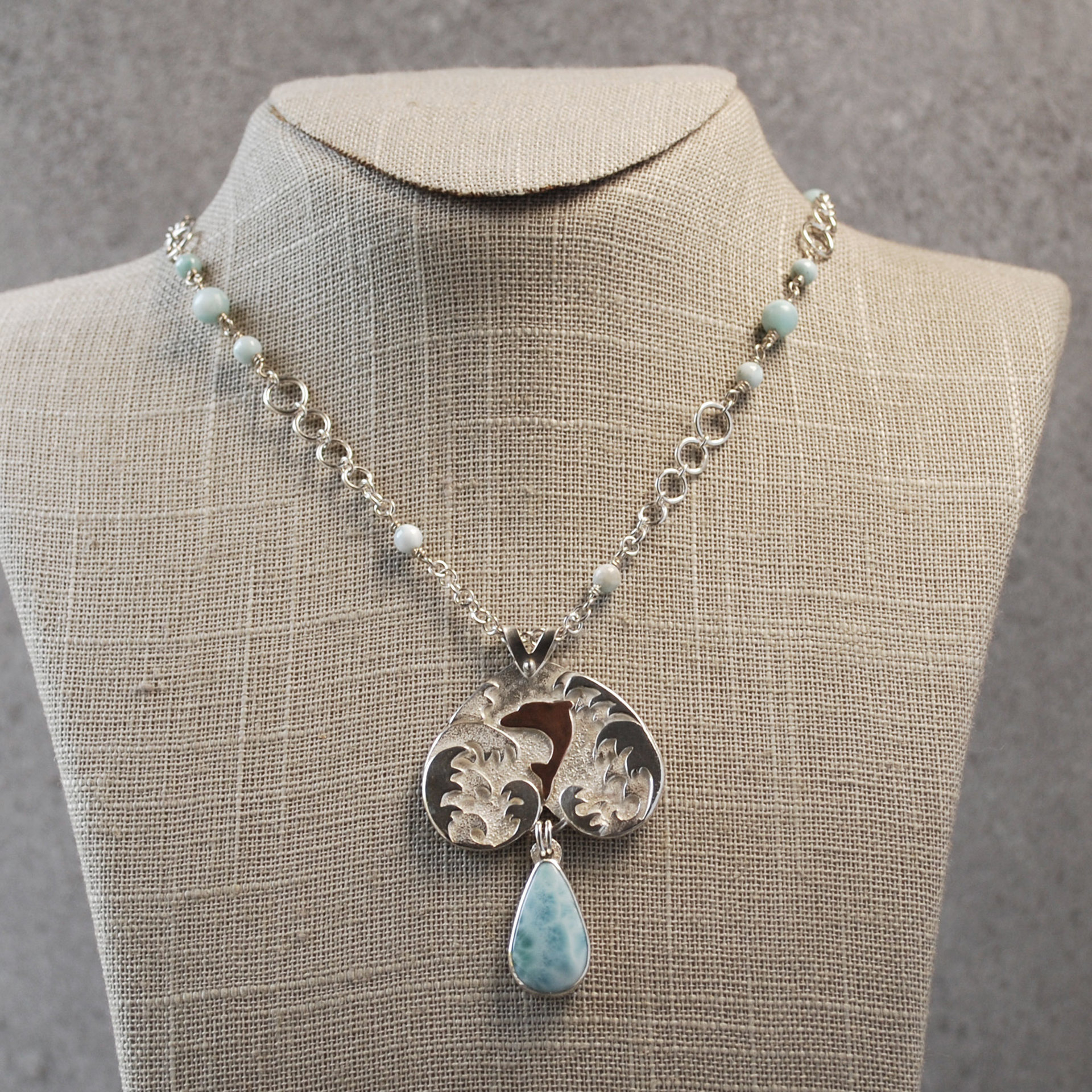 Larimar Pendant, Silver Waves, Dolphin, hanging
