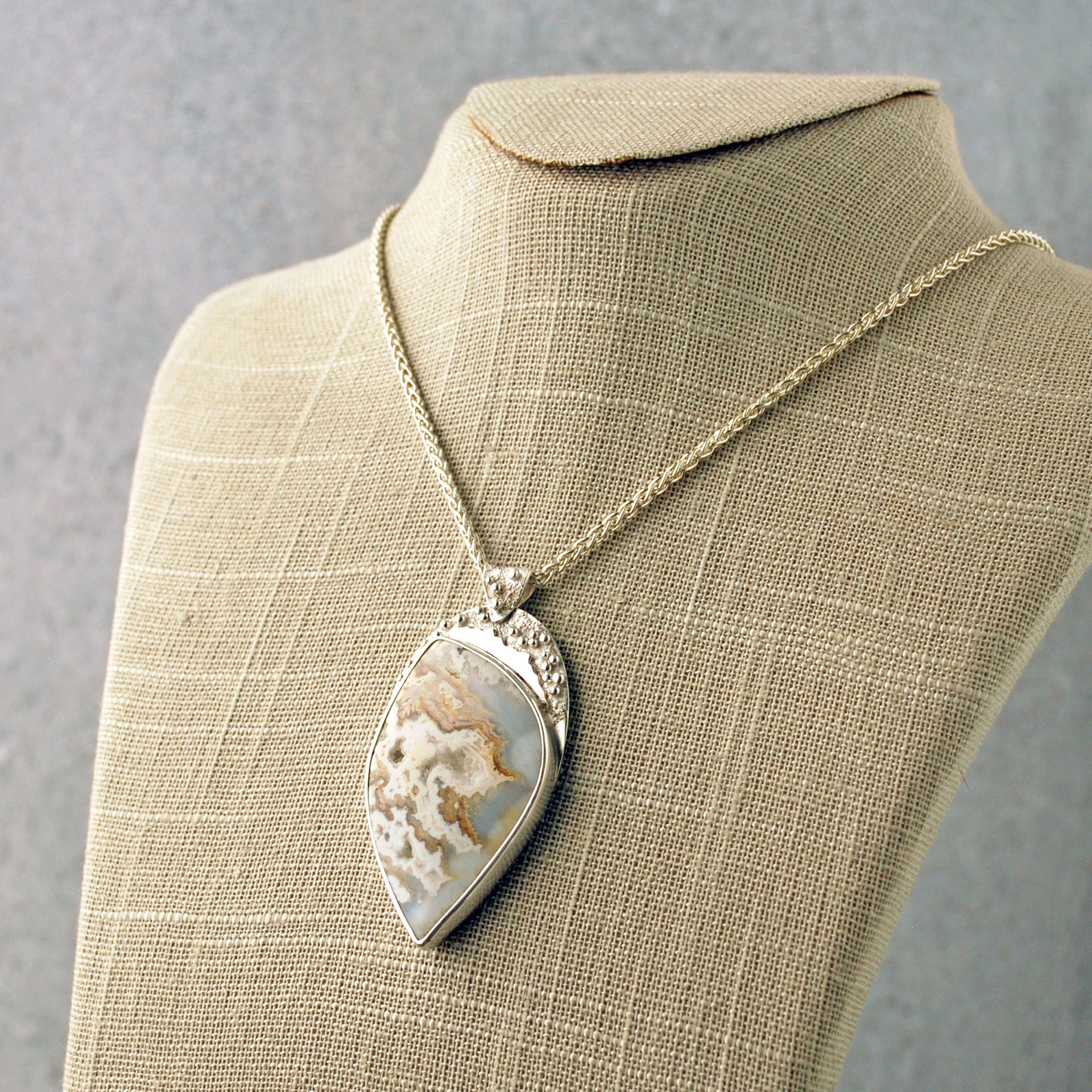 Plume Agate Pendant, with Druzy, Sterling Silver hanging at angle