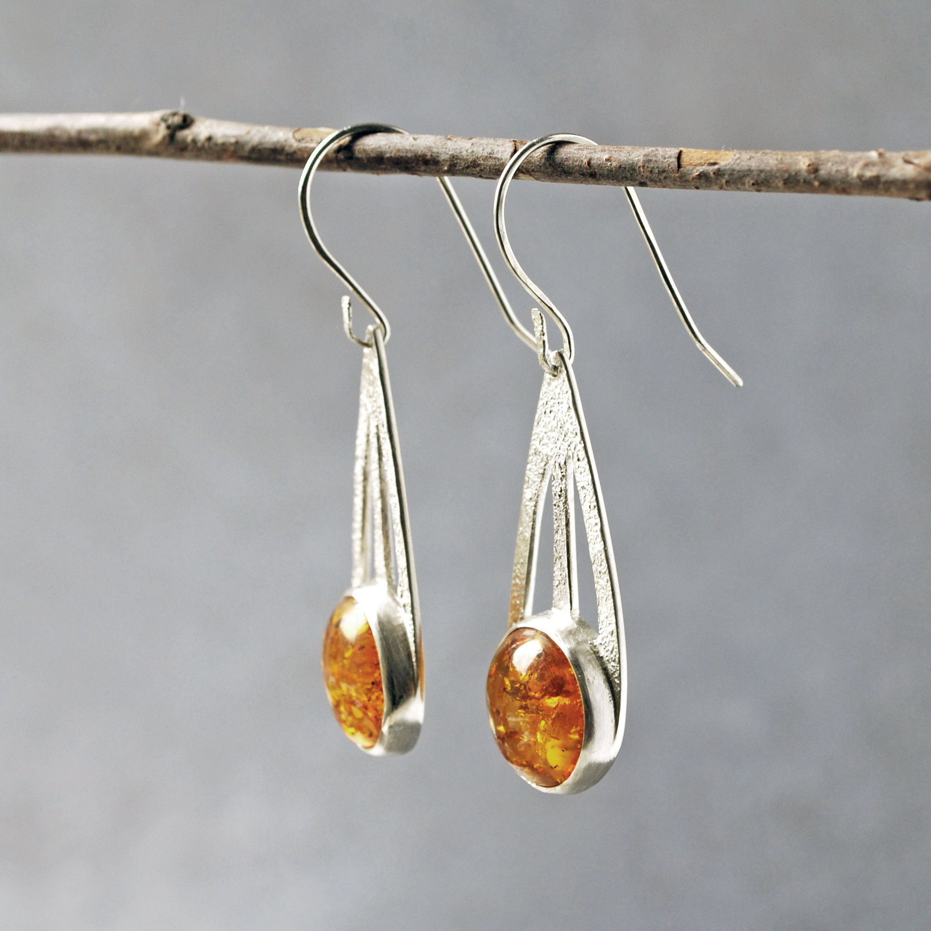 Baltic Amber Silver Drop Earrings hanging angle