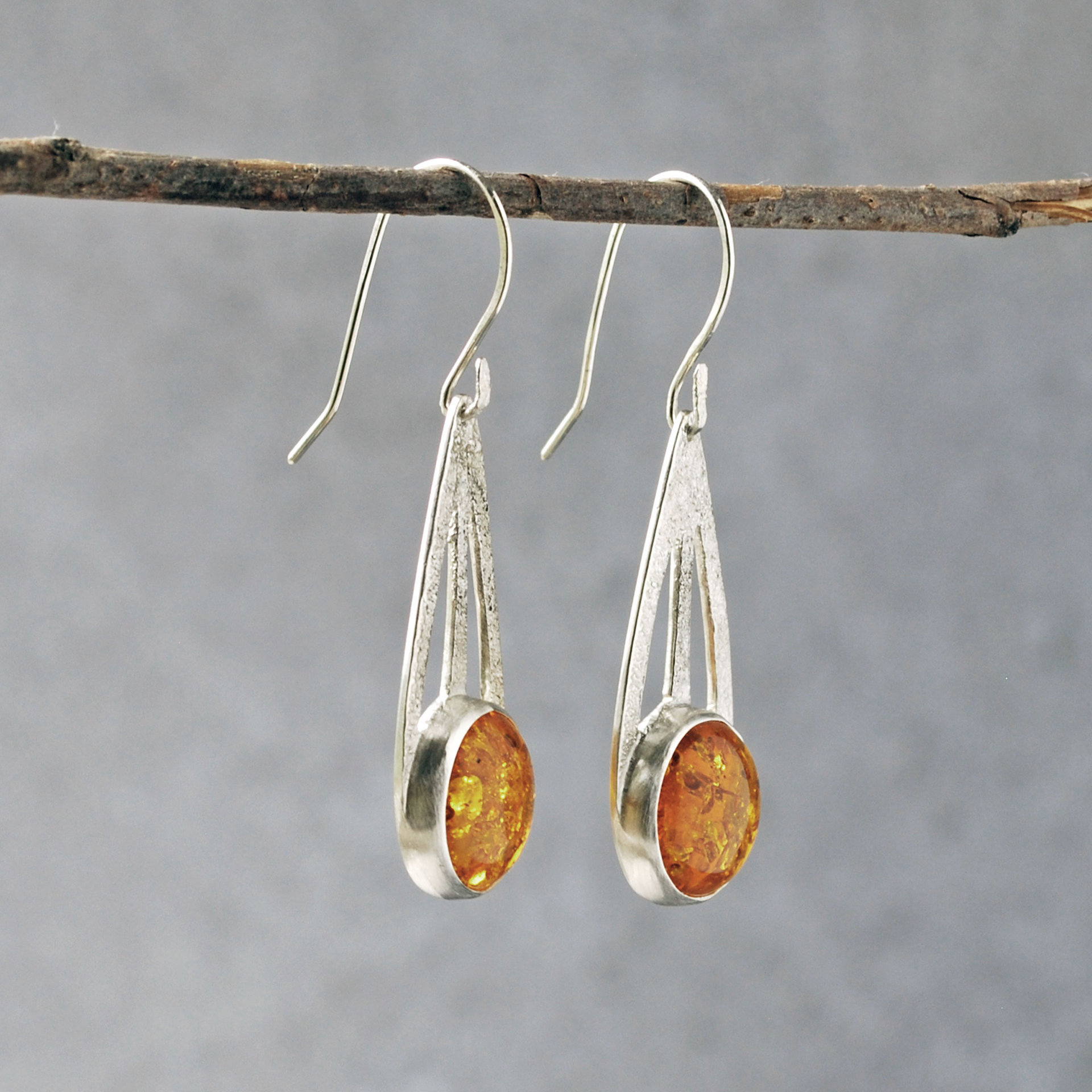 Baltic Amber Silver Drop Earrings hanging angle