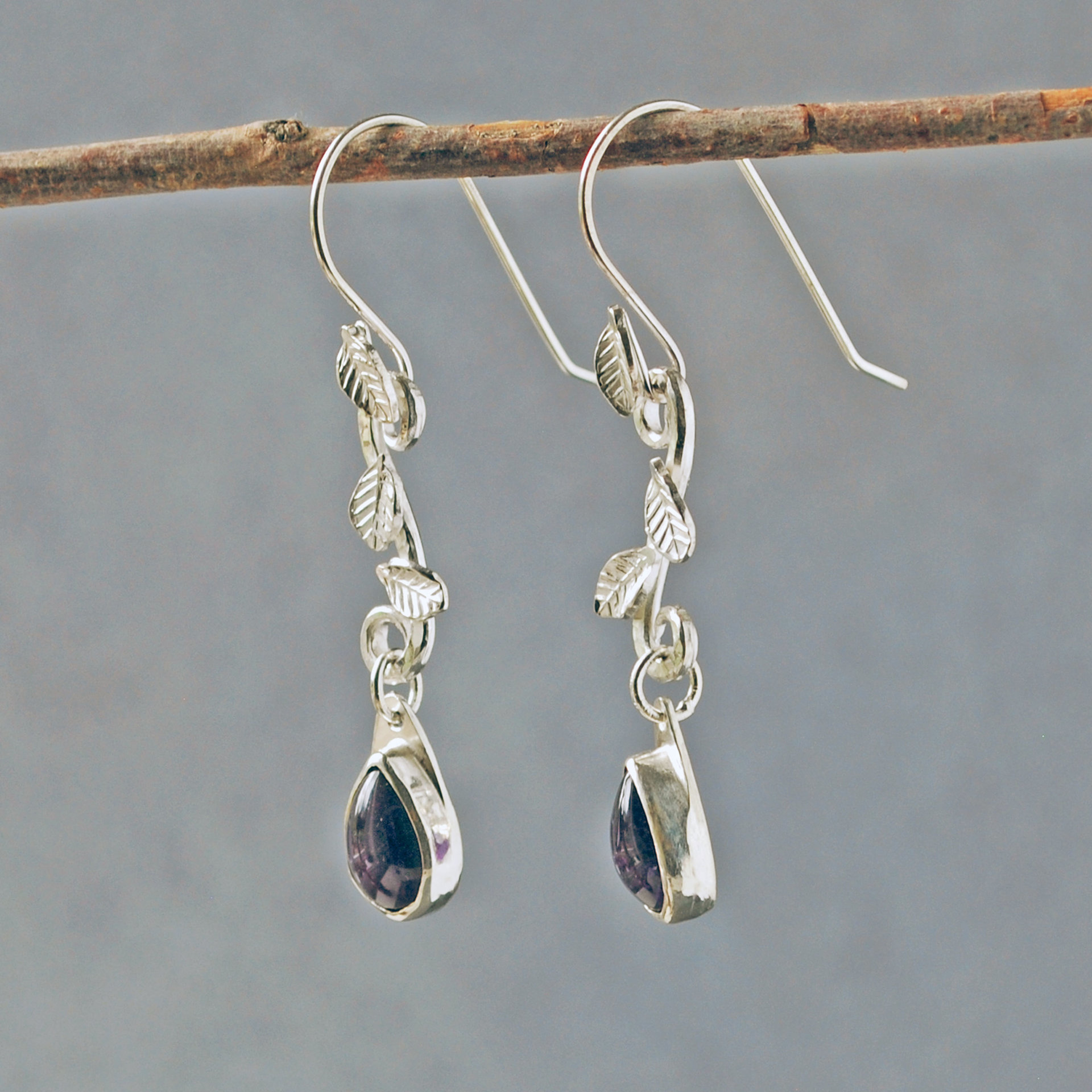 Amethyst Drop Earrings with Silver Leaves, hanging side view