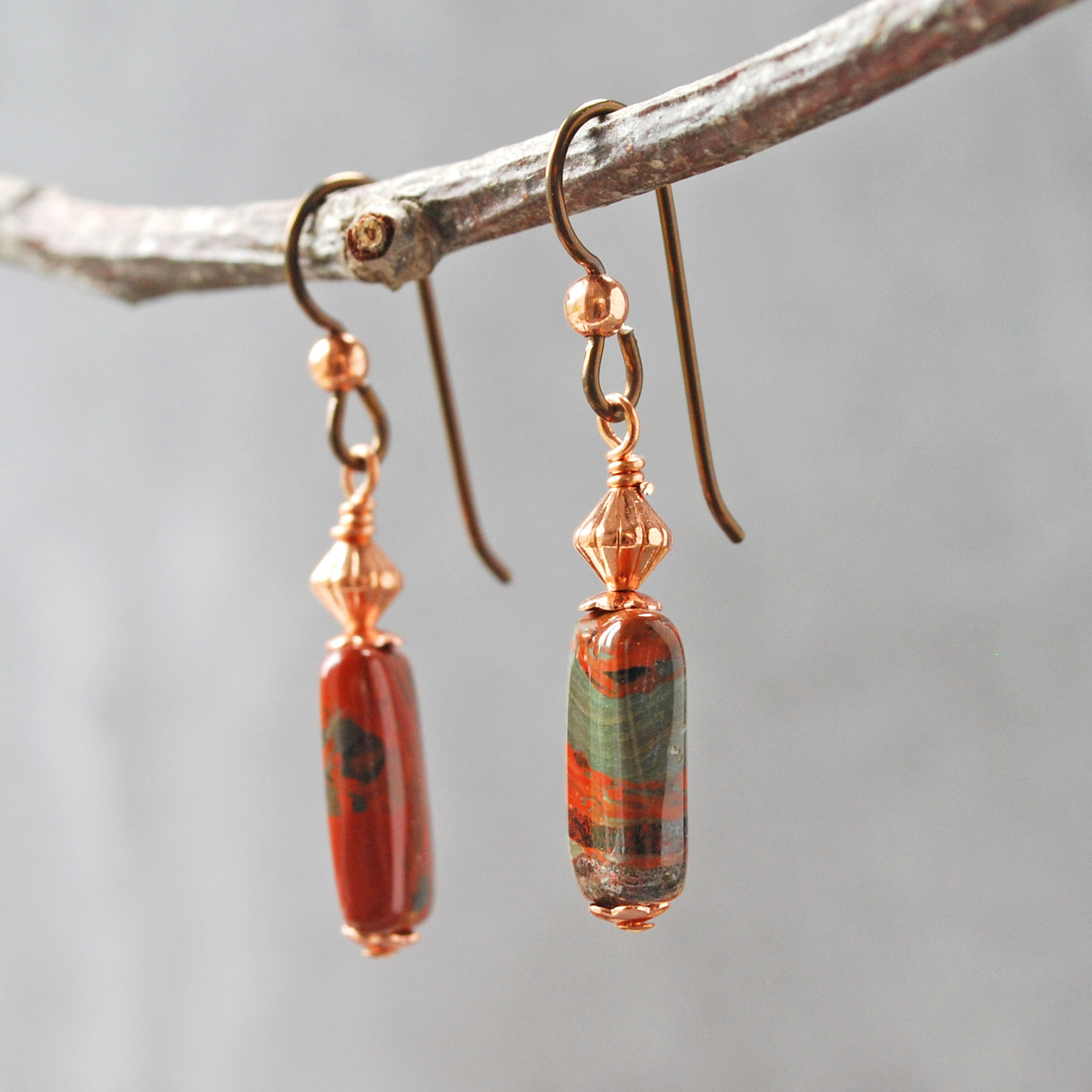 Dangling earrings with flame jasper and copper beads hanging backs