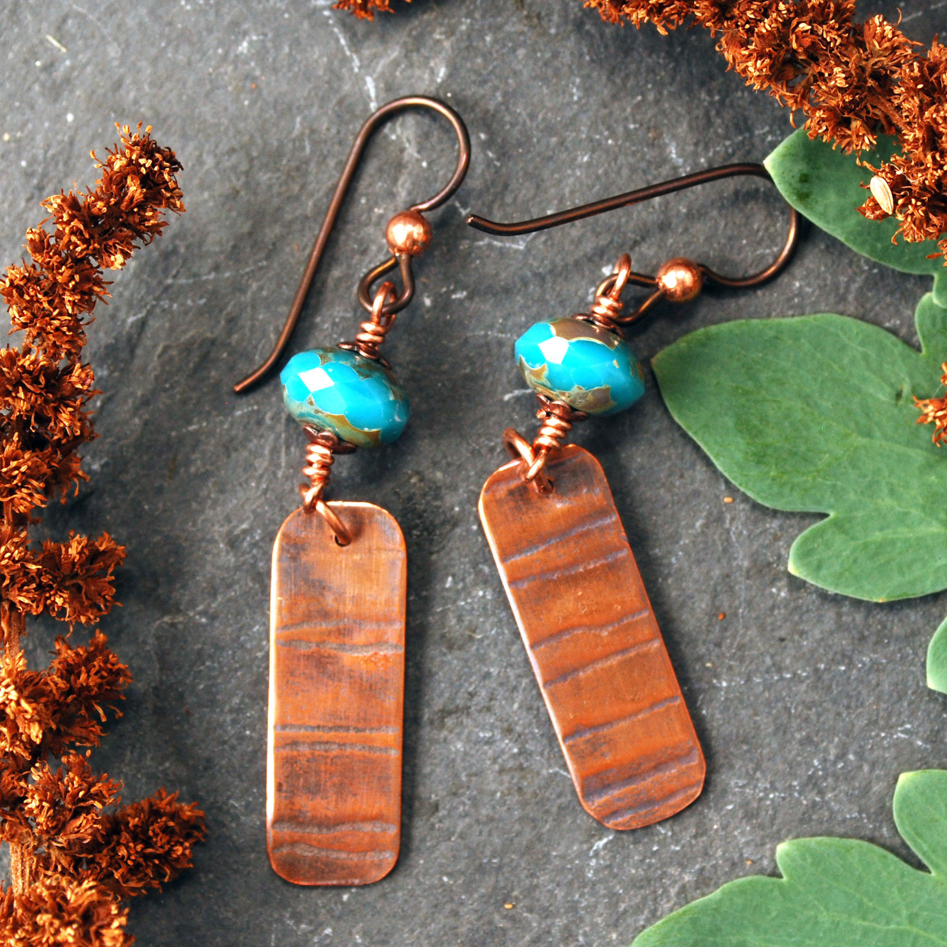 Earrings with corrugated copper rectangle dangles and turquoise Czech glass bead on top