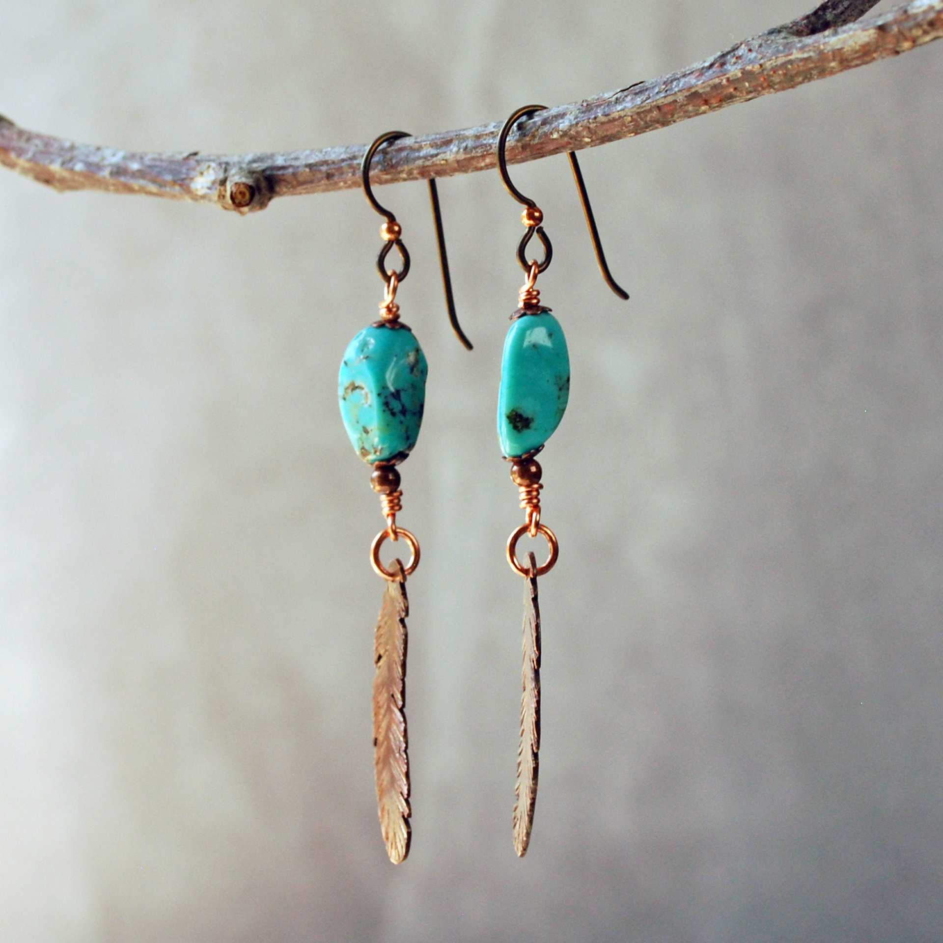 Turquoise earrings with copper feathers