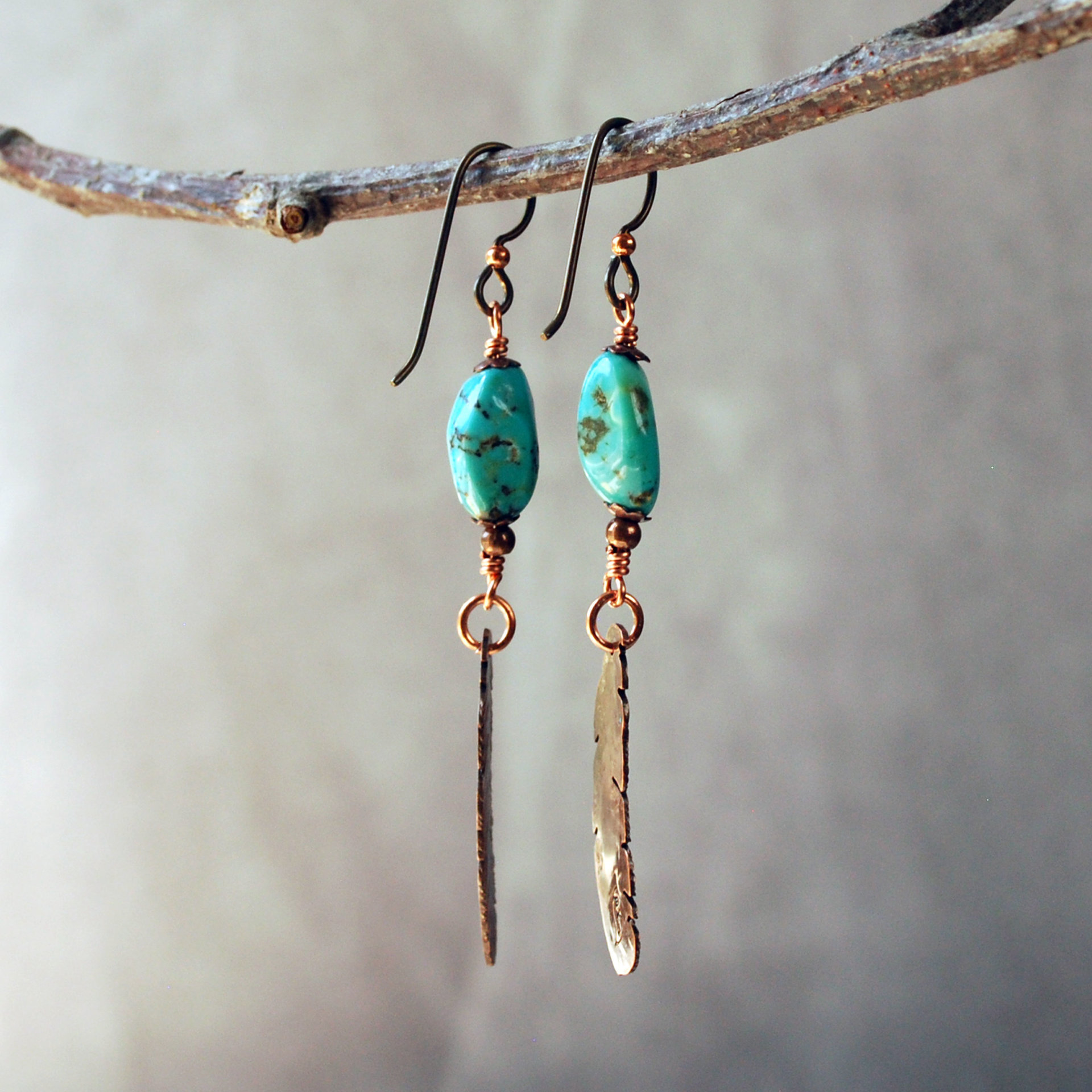 Turquoise earrings with copper feathers