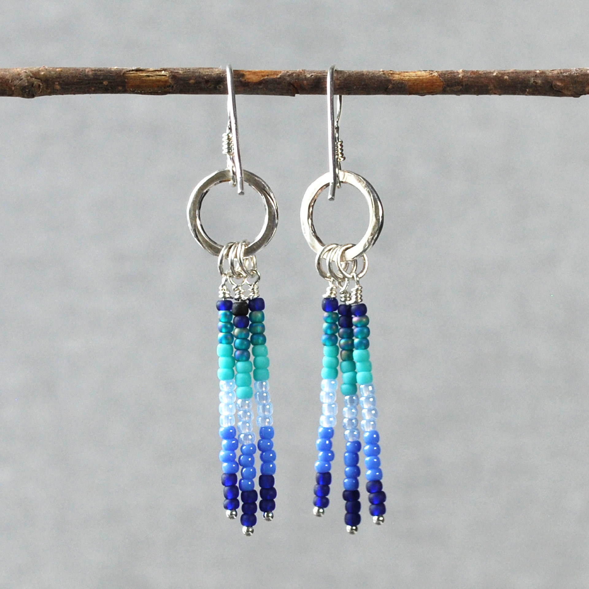 Silver earrings with blue, turquoise dangles