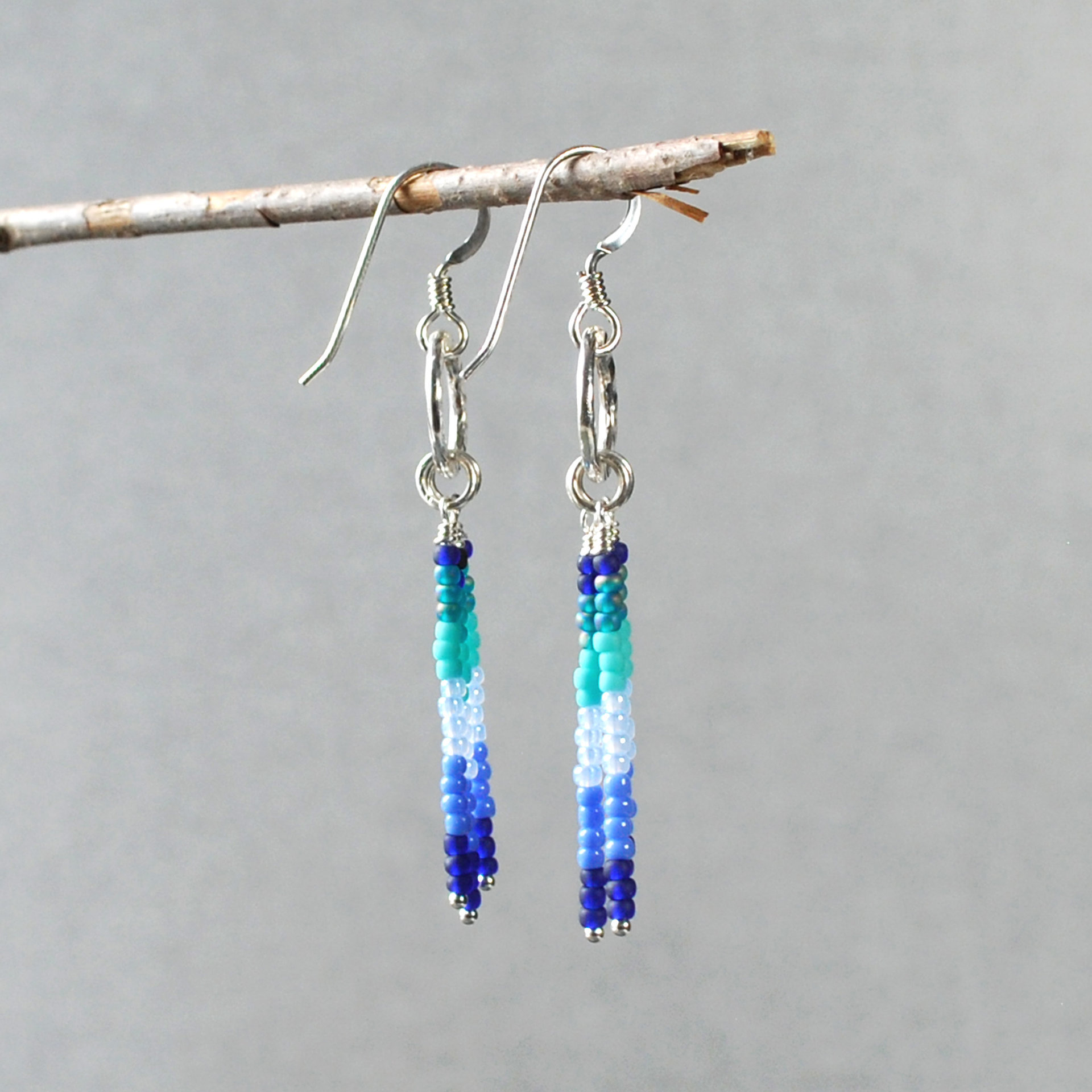 Silver earrings with blue, turquoise dangles