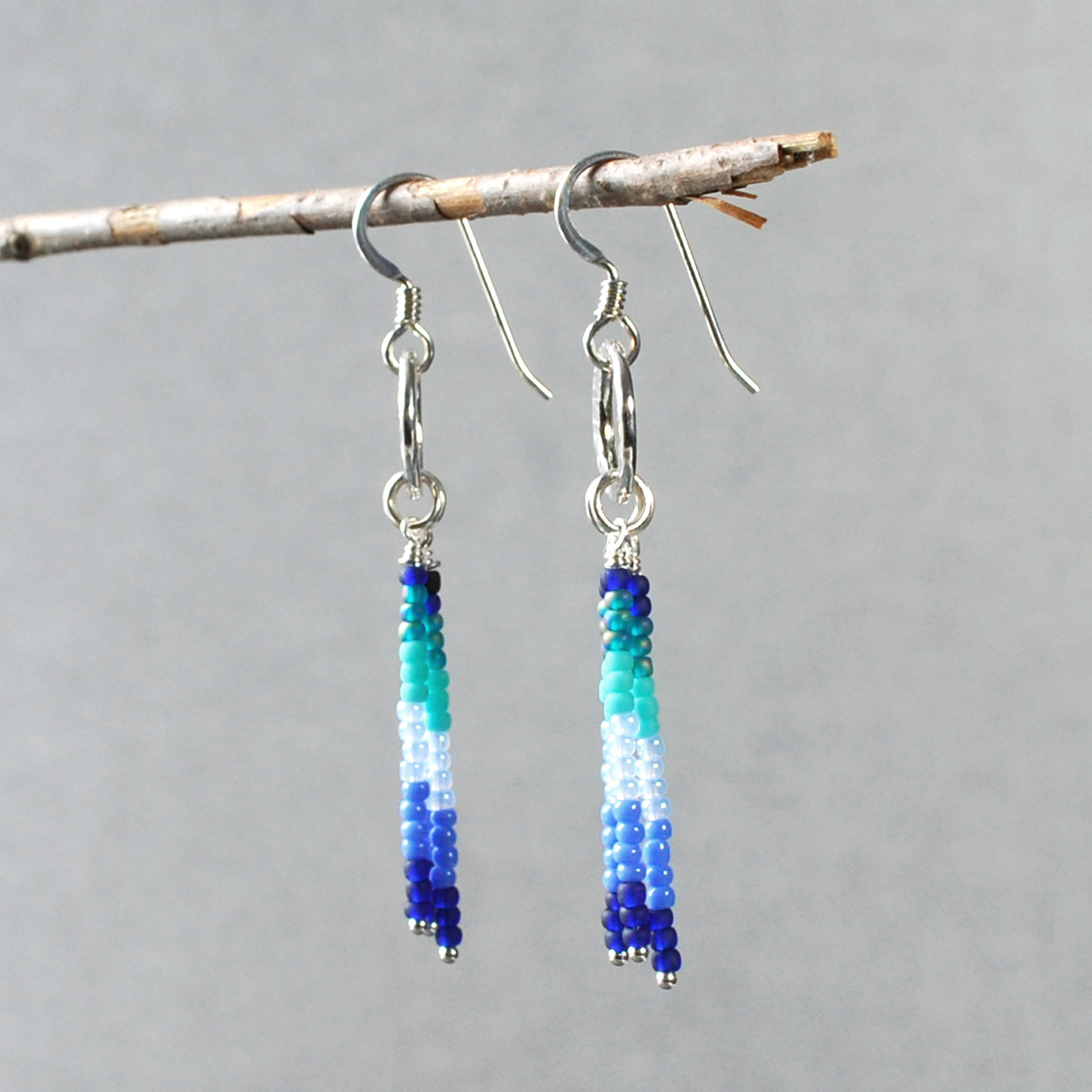 Silver earrings with blue, turquoise dangles
